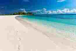 Tropical paradise - beautiful beach with white sand and ocean view
