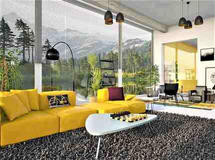 Modern room interior with large windows and a beautiful mountains view outside