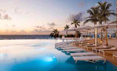 Experience the breathtaking beauty of a sunset and the majestic ocean view while staying at the Hotel Le Blanc Spa Resort in Cancun.